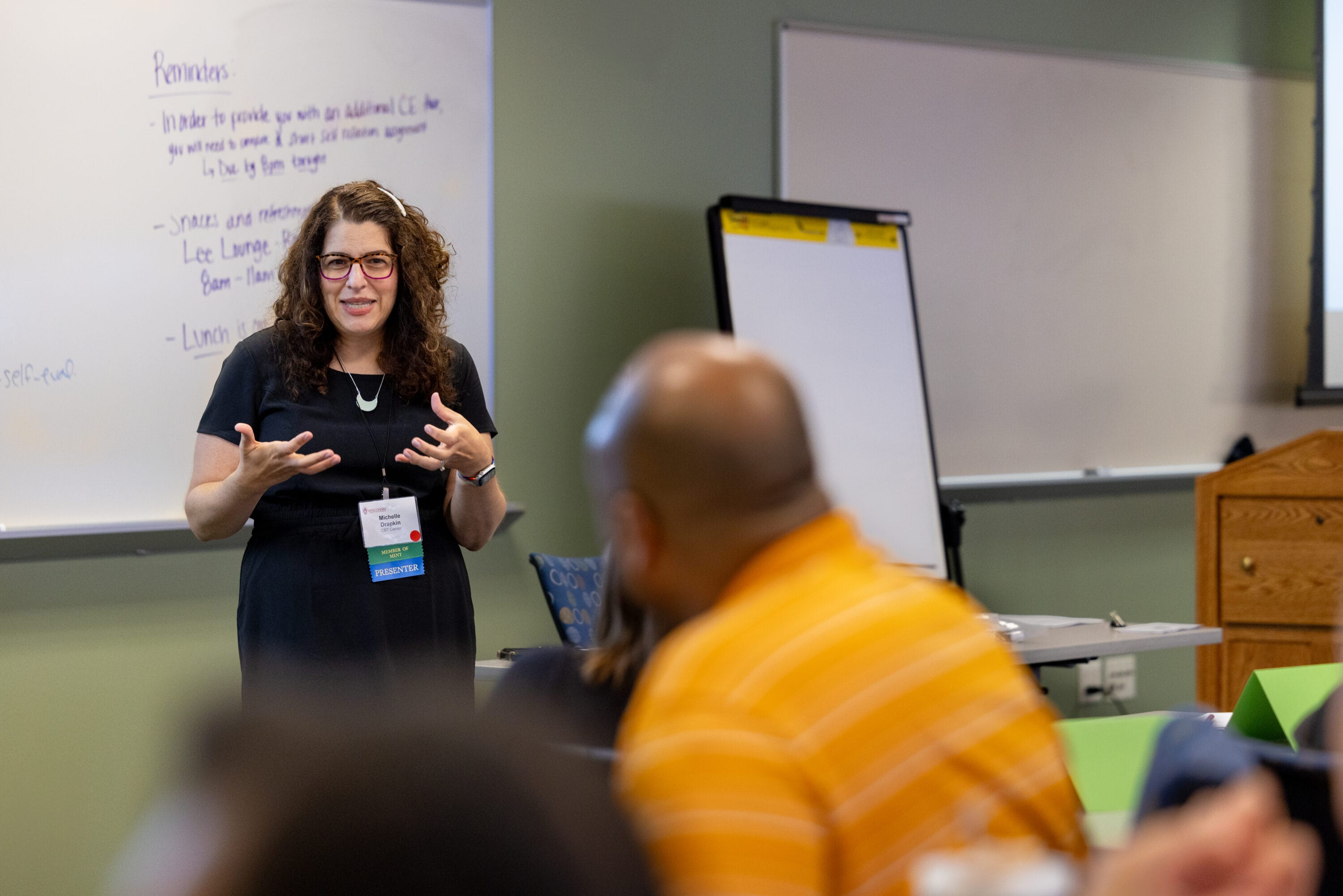 Instructor standing in front of attendees
